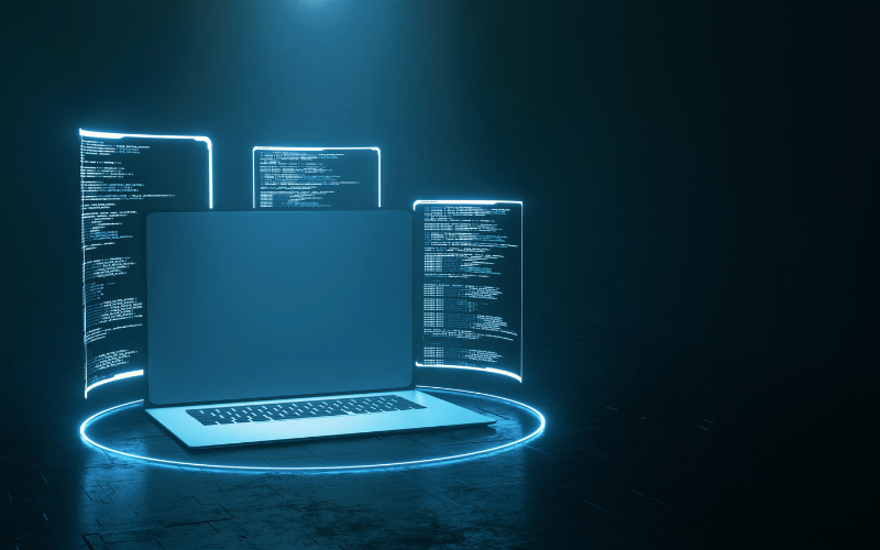 Laptop con código y pantallas digitales representando inteligencia artificial en desarrollo de software.